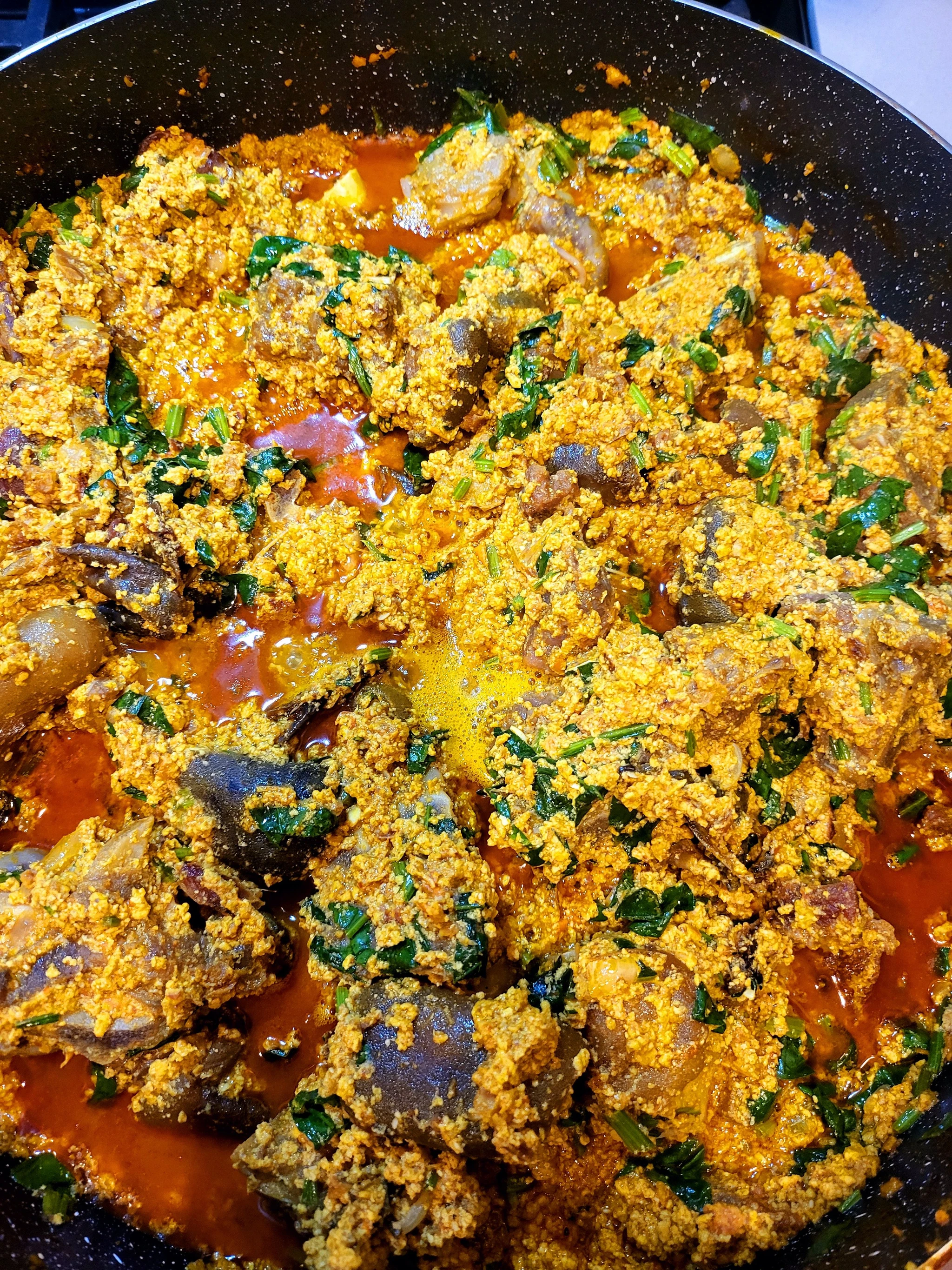 Egusi soup with leafy greens and assorted meat